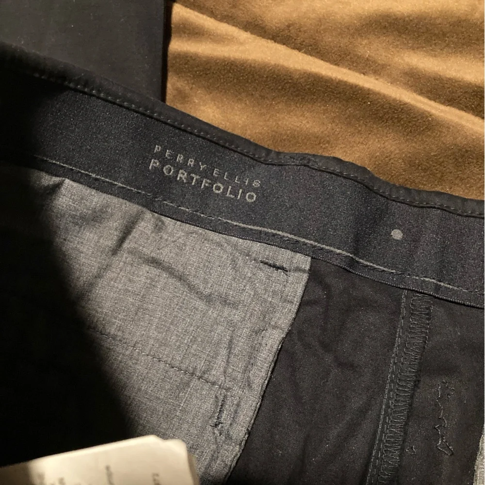 Perry Ellis brand, size 33 x 32, new with tags, dark sapphire color, men’s pants